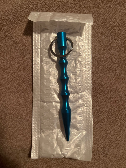 Self defense pin